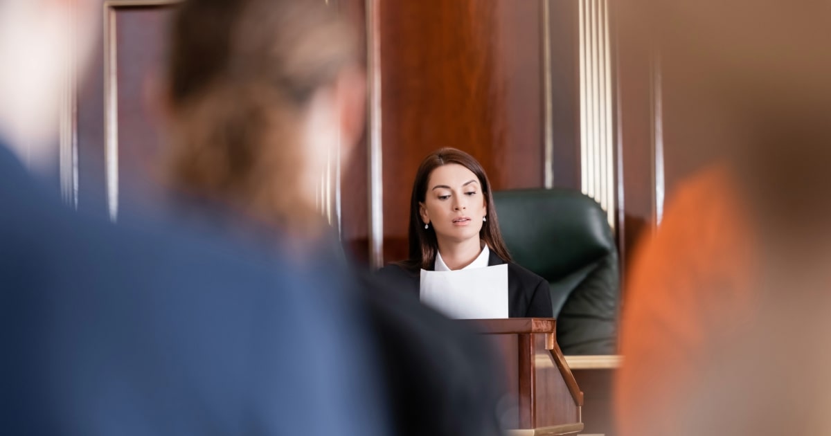 judge reviewing case in court room