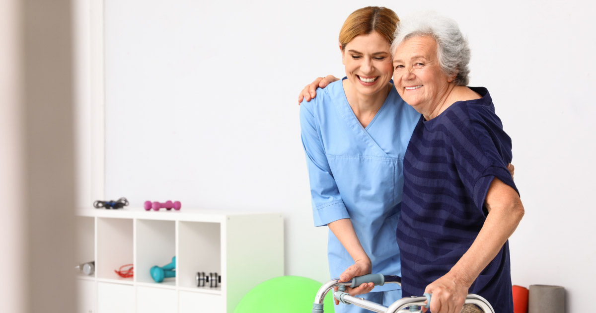 Elderly woman with younger medical care professional