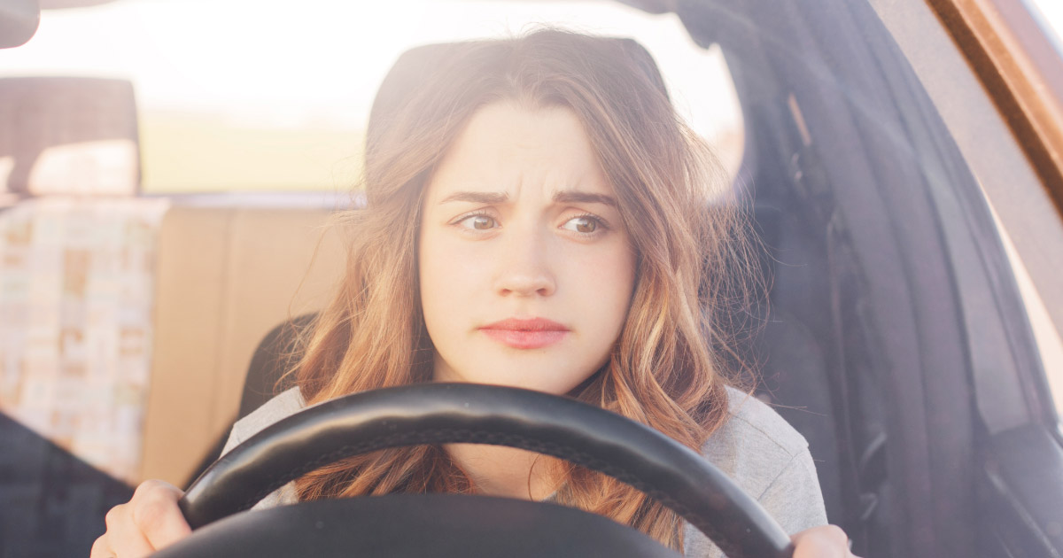 Woman cautiously driving to work